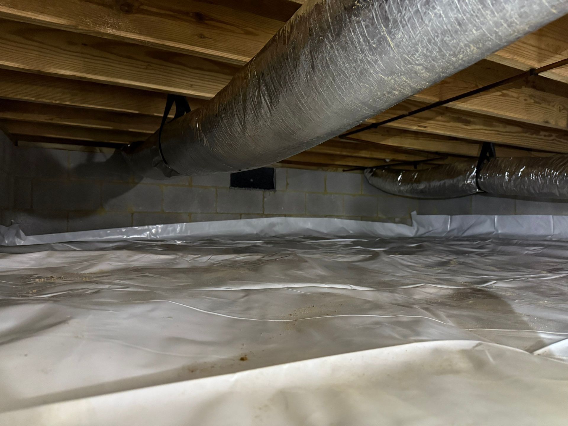 Hybrid encapsulation sealed crawl space vents Running Man neighborhood of Yorktown.