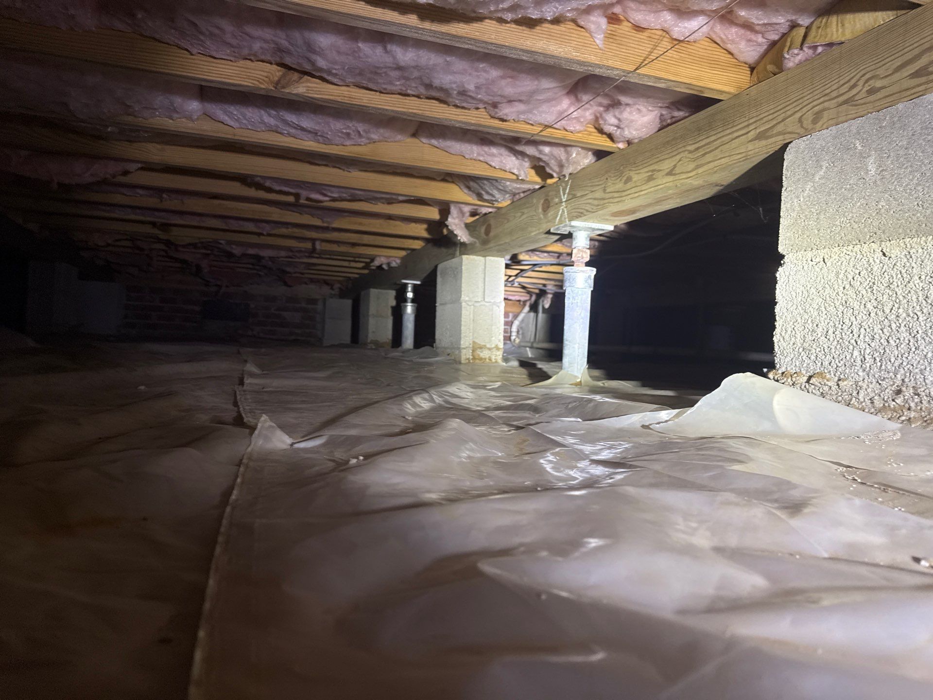Crawl space support jacks post cleanup in Yorktown VA - Yorkshire Downs neighborhood.
