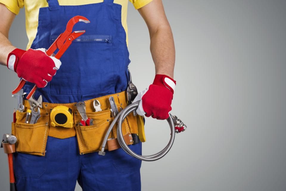 plumber with tools