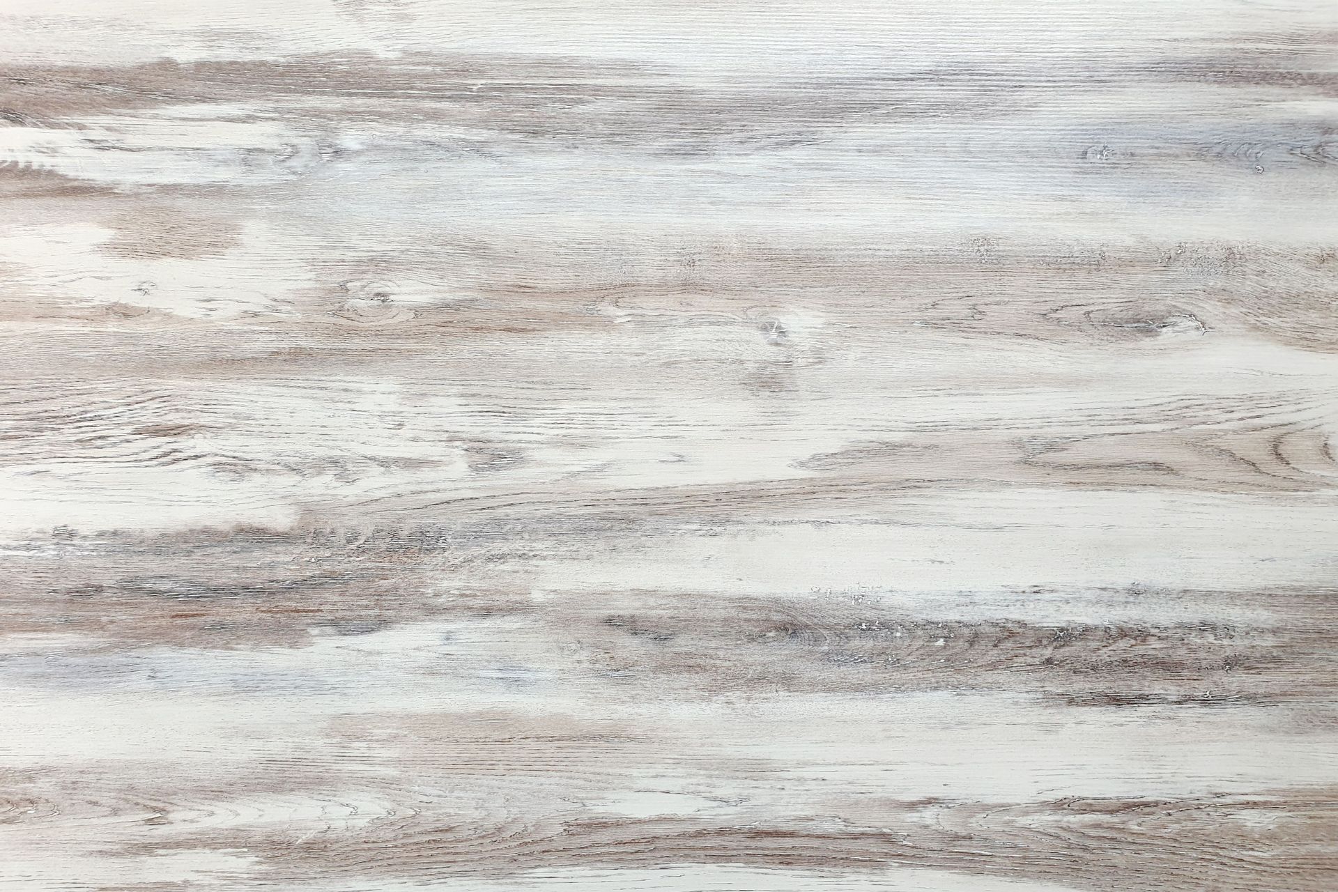 Light woodgrain texture with white, gray, and beige horizontal streaks