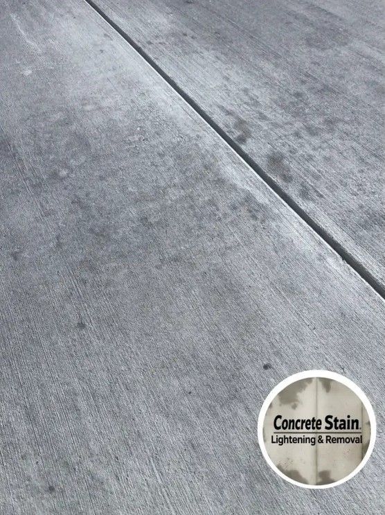 A close up of a concrete surface with a logo for concrete stain lightening and removal