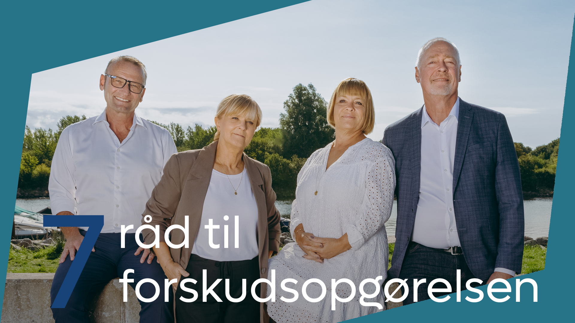 Four people standing outside; text: 