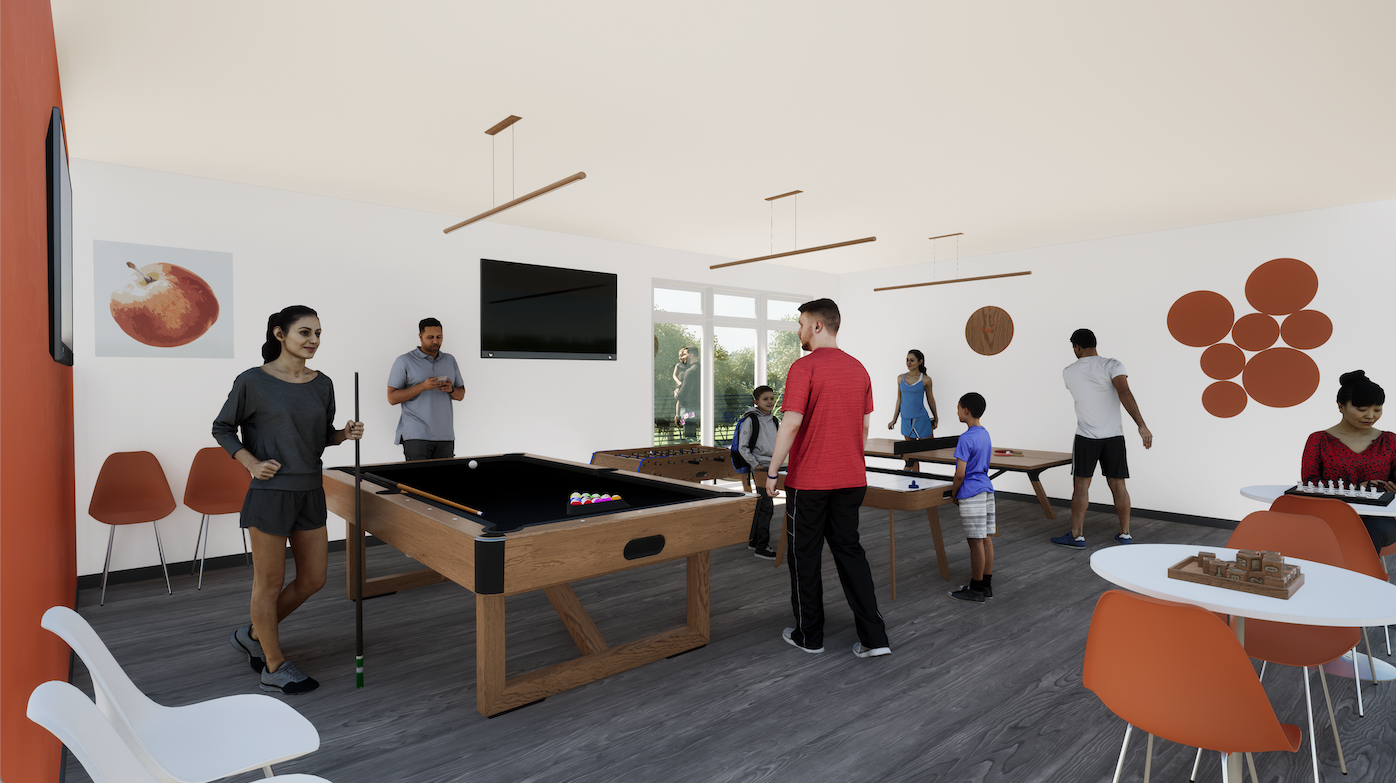 A group of people are playing pool in a game room.