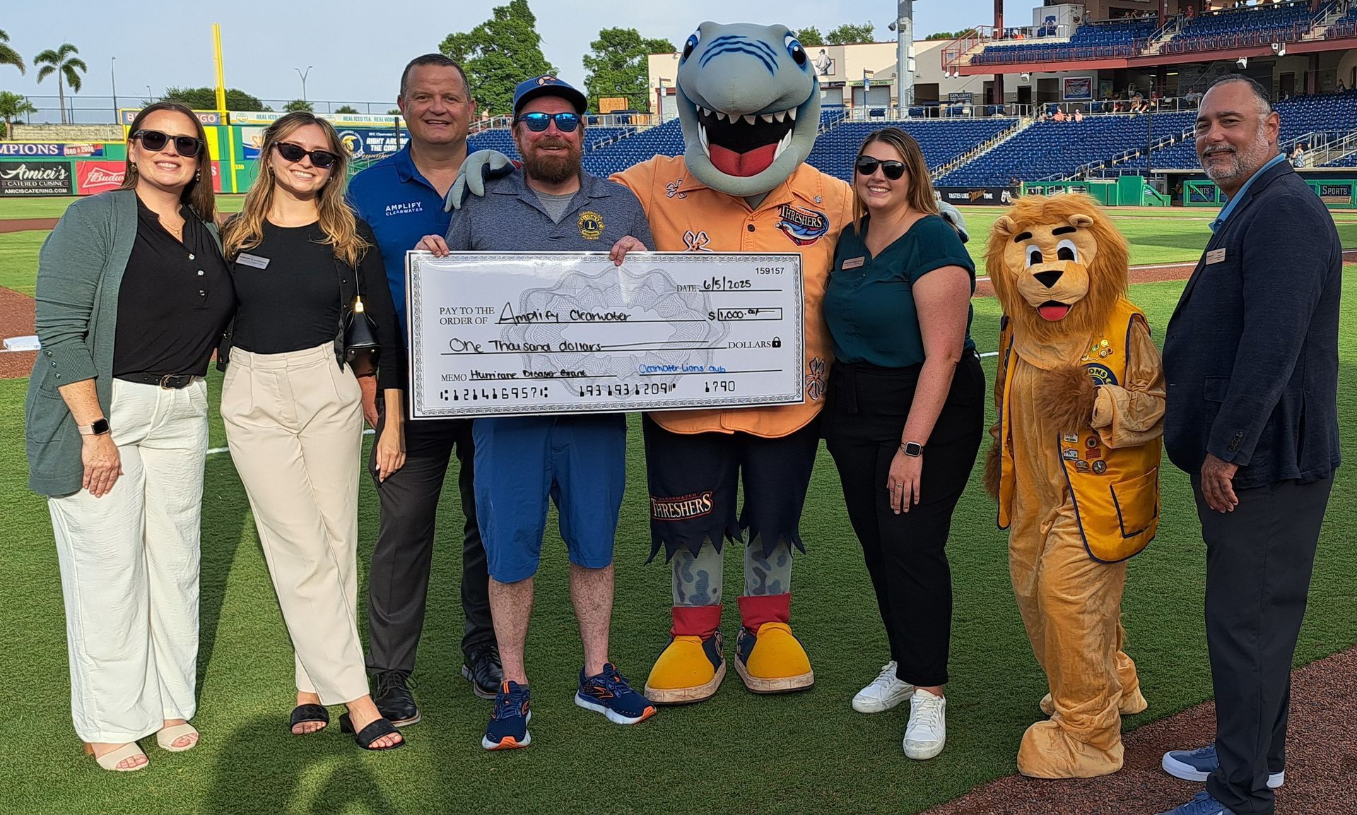 Thank you to Amplify Clearwater, especially Jennifer Torello and the President & CEO, Amanda Payne
 and the staff, Joe Lugo, Amanda Payne, Brianna Saraceno and Meegan Massey for taking their time to participate in our event by accepting our $1000 donation to the Phillies/Threshers Hurricane Relief Fund for local Clearwater residents. The Phillies Spring Training organization matched our donation! We could not have done this without Victoria Phipps and Corie Sipp of the Phillies Spring Training and Threshers organizations. They made it happen for the Clearwater Lions Club.
You have the heart of a Lion! 
Thank You!  
