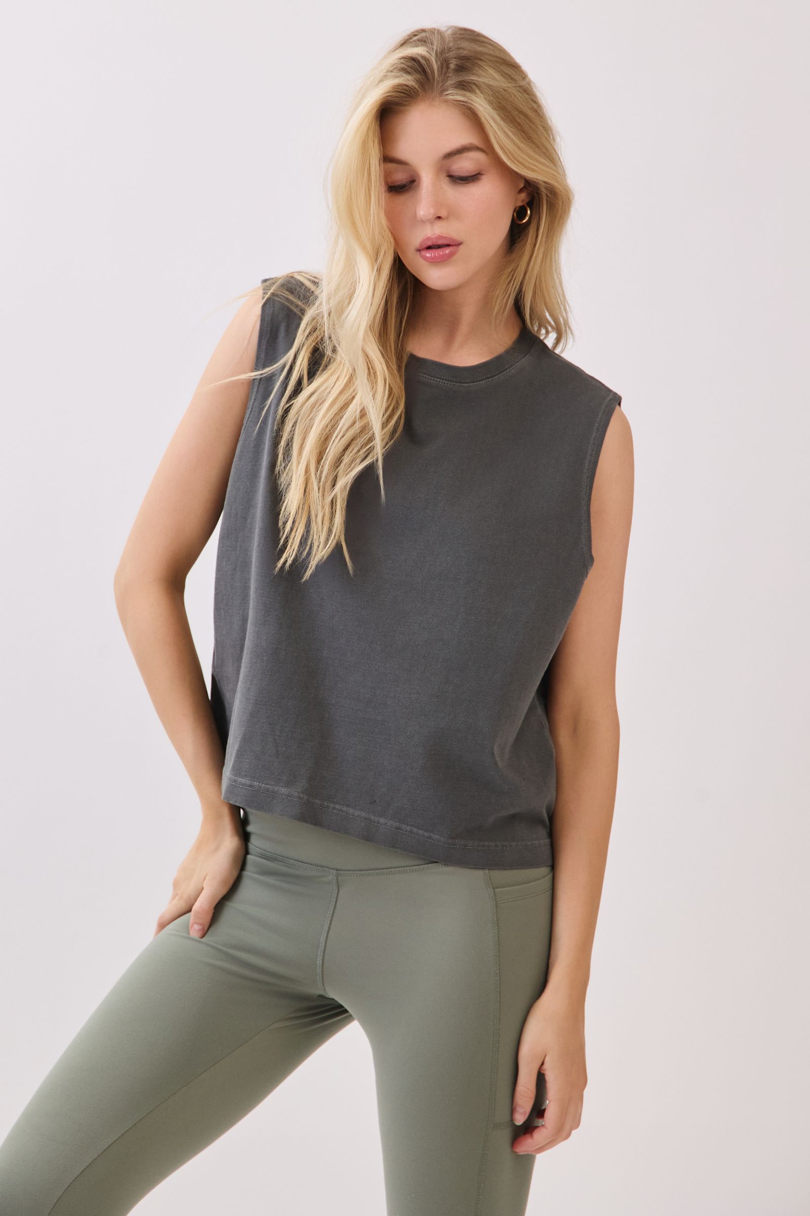 A woman wearing a top