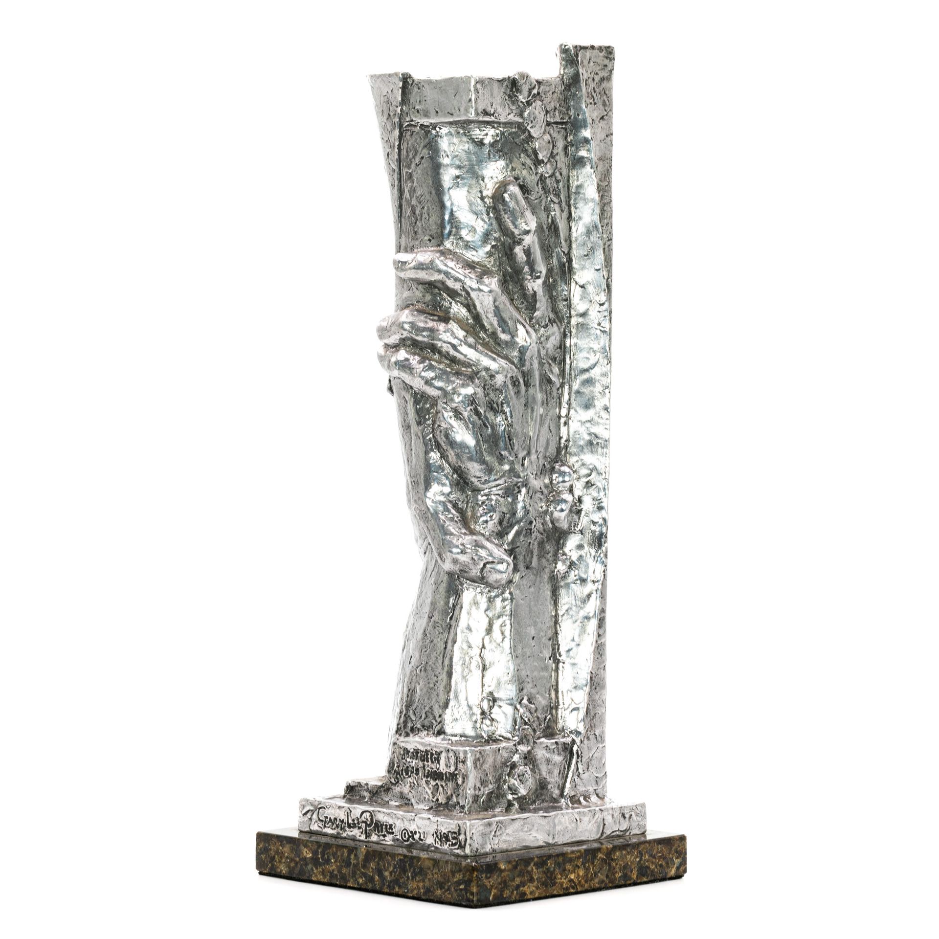 A small aluminum replica of the statue of responsibility available for purchase