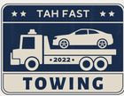 A towing truck with a car on the back of it.