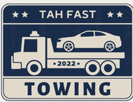 A towing truck with a car on the back of it.