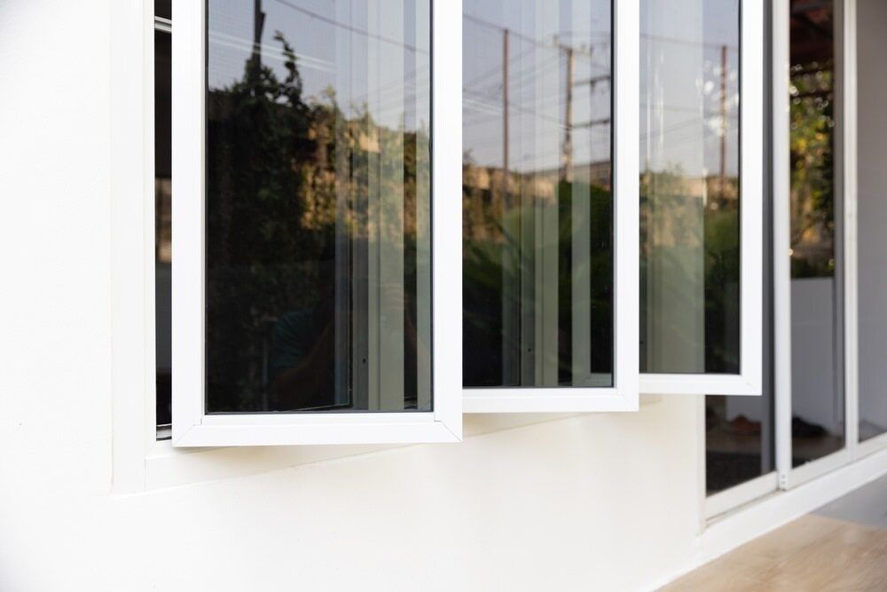 Three White-framed Casement Windows Partially Open — ACG Windows & Glass in Cranbourne, VIC