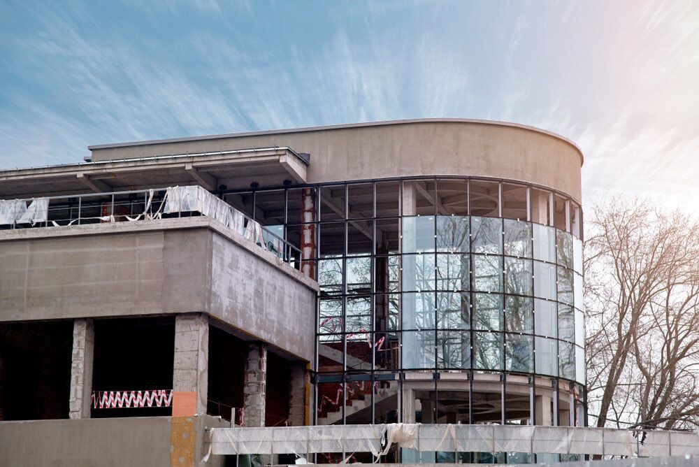 A Multi-level Building Under Construction With Concrete Walls — ACG Windows & Glass in Cheltenham, VIC