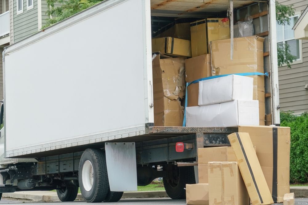 Moving Truck Loaded With Cardboard Boxes — The Move It Man In Cairns, QLD