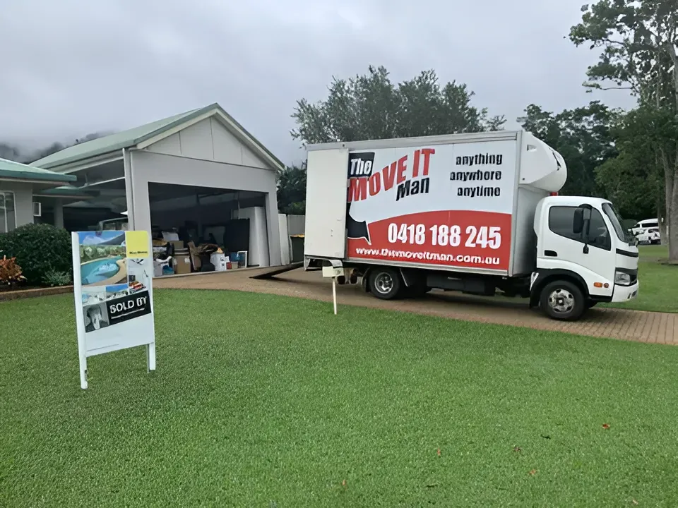Moving Truck Parked in Front of a House — The Move It Man In Bentley Park, QLD