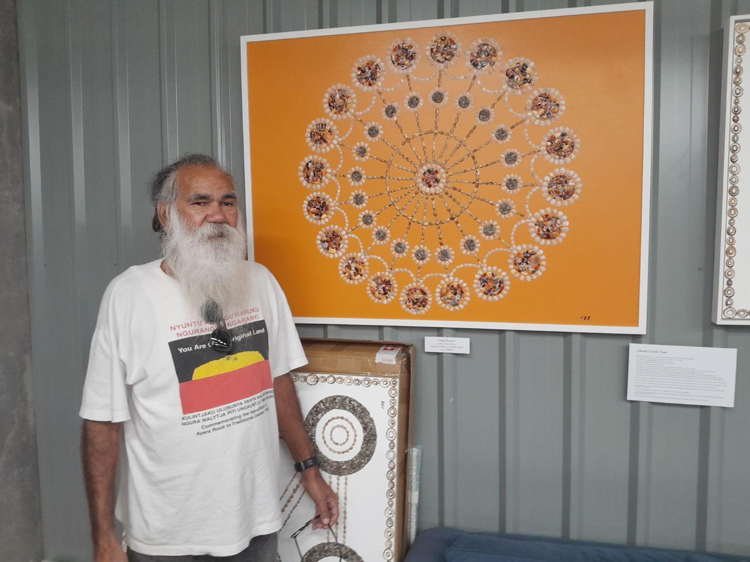 Man In Front Of His Artwork — Framing in Shoalhaven, NSW