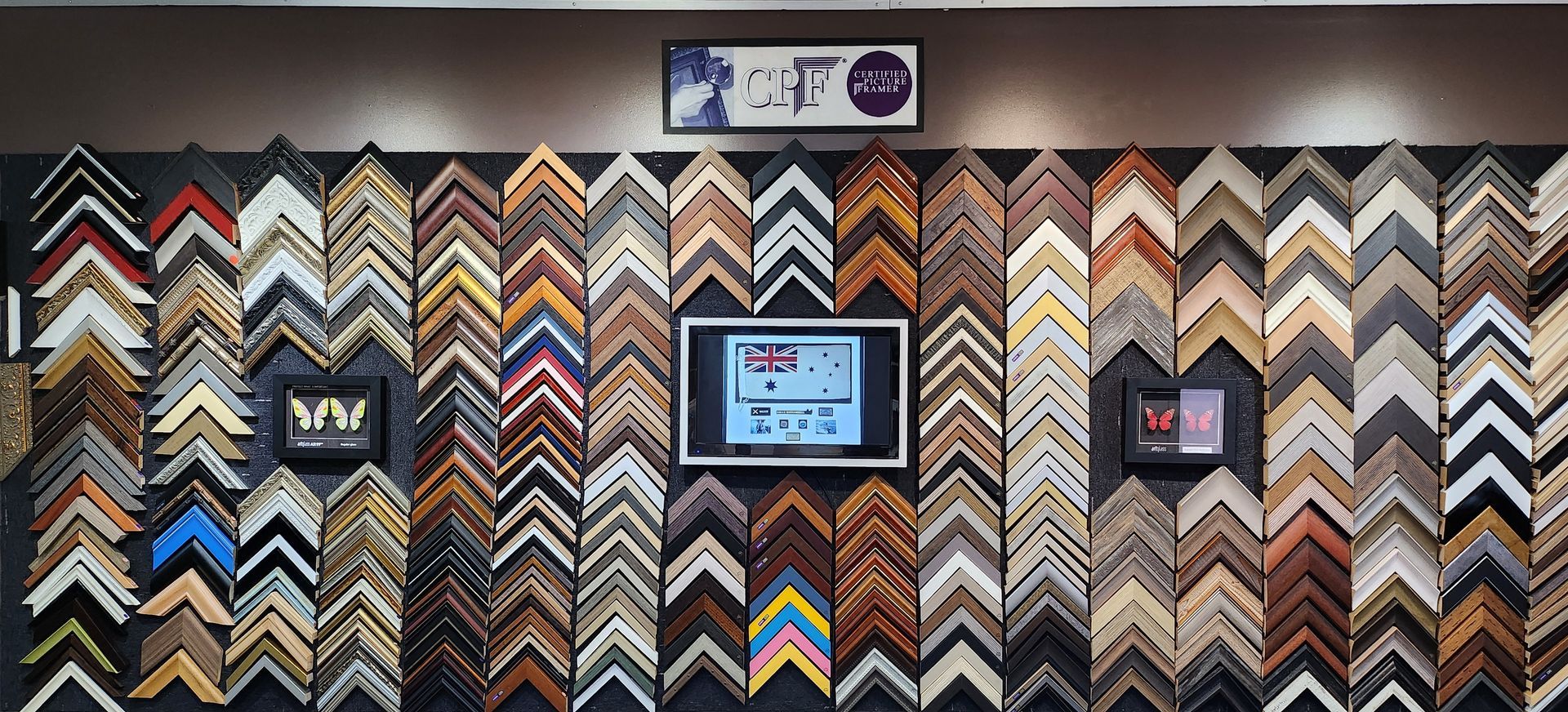 Framed art on feature wall — Framing in Shoalhaven, NSW