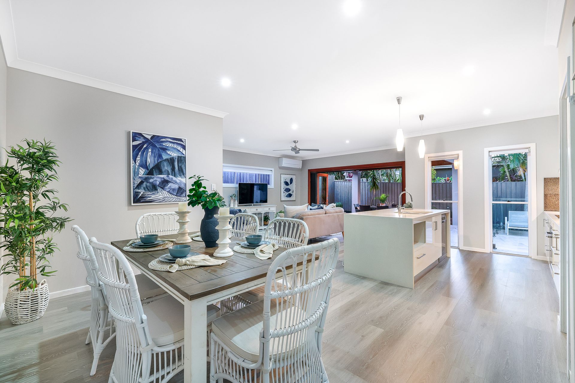 A dining room table and chairs in a house.