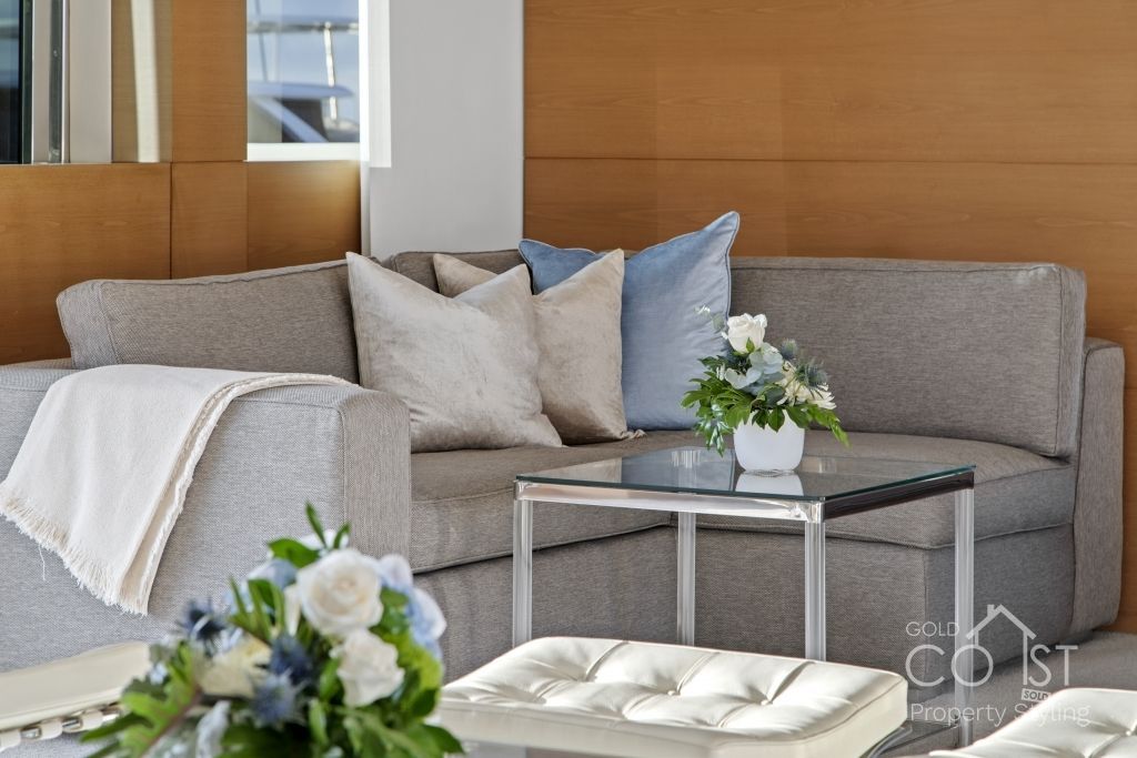 A living room with a couch and a coffee table