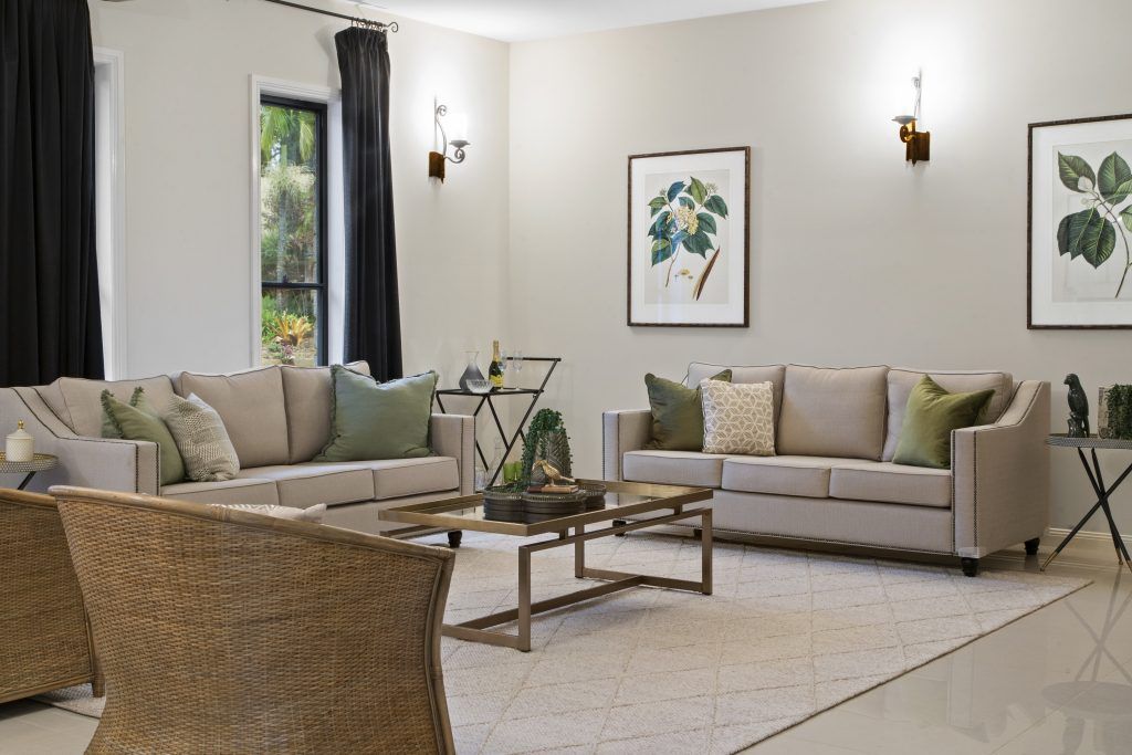 A living room filled with furniture and a coffee table.