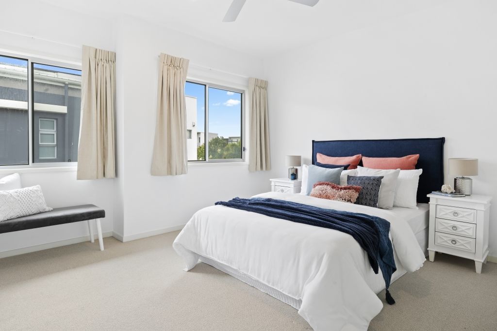 There is a large bed in the middle of the room.