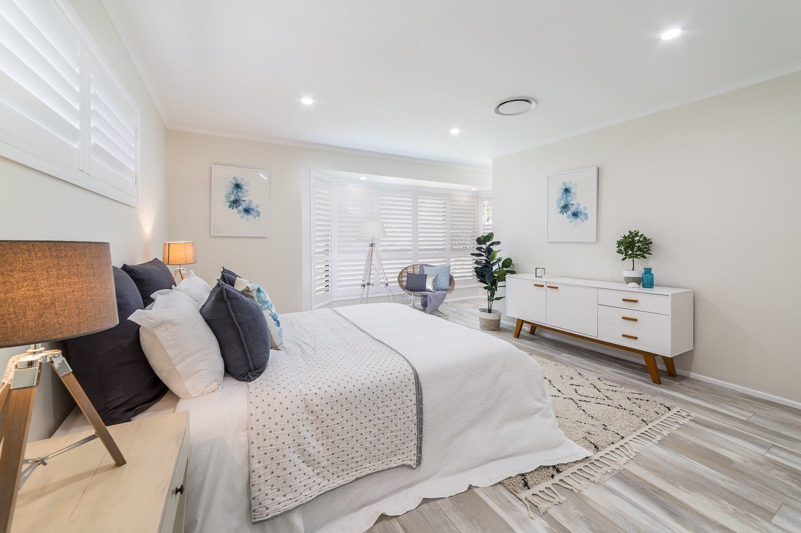 There is a large bed in the middle of the room.