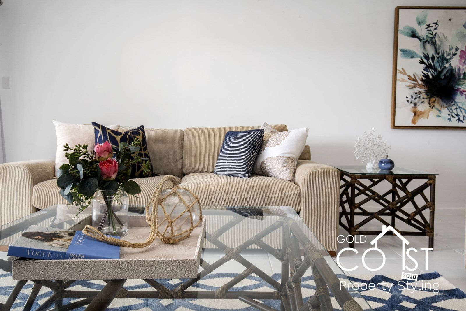 A living room with a couch and a coffee table
