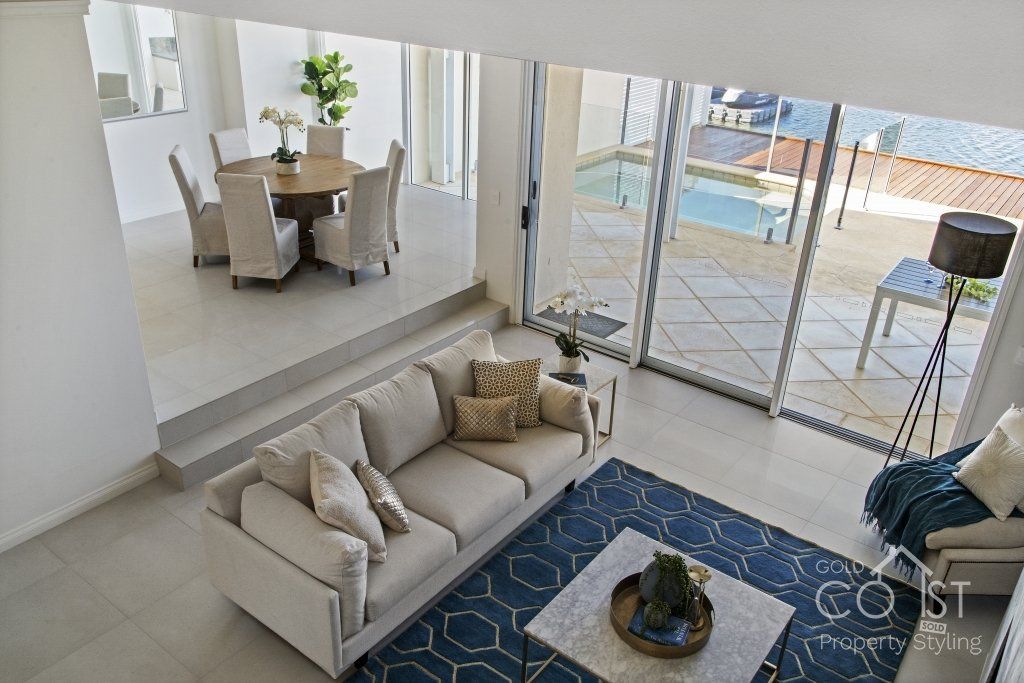 An aerial view of a living room with a couch and a table