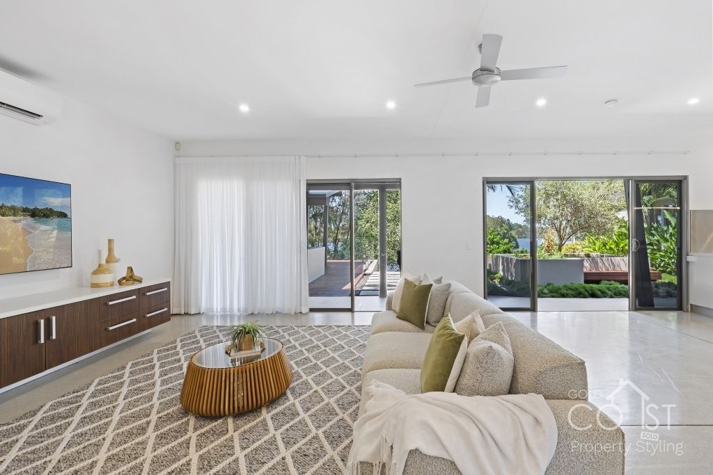 A living room with a couch and a coffee table