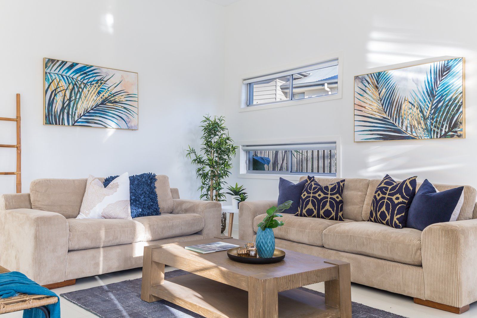 A living room with two couches and a coffee table.
