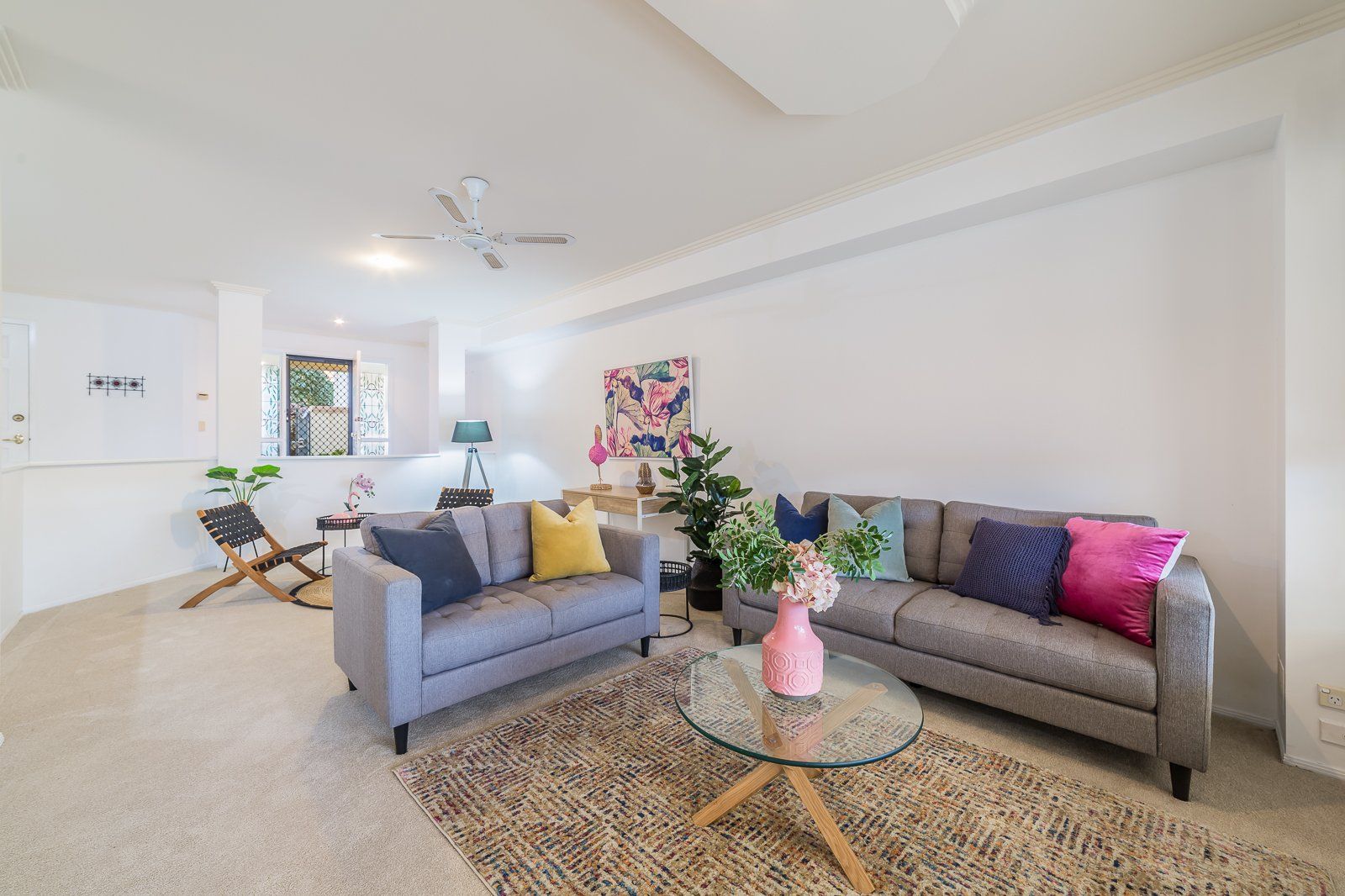 A living room with two couches and a coffee table.