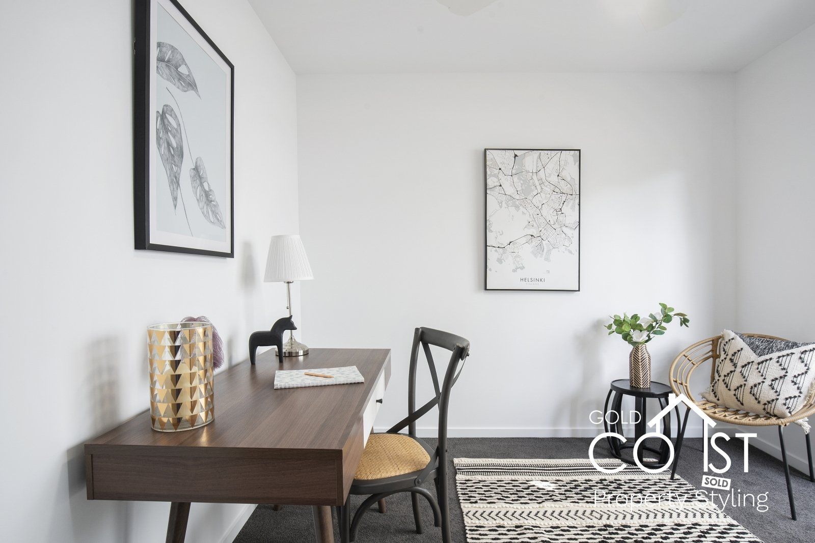 There is a desk and chair in the room.