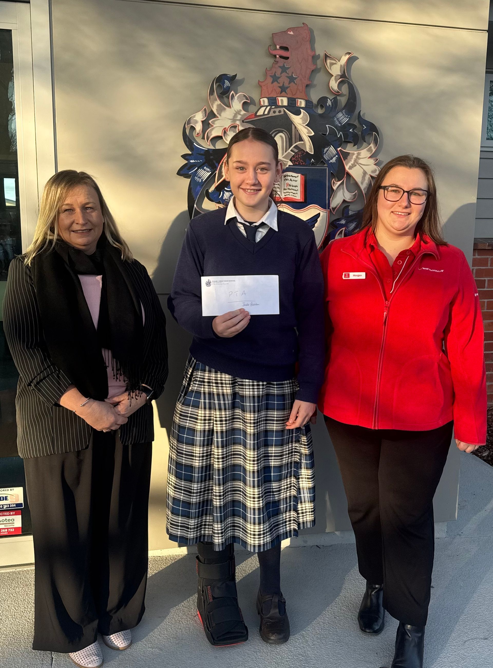 Leola Wilson PTA Chairperson; Jade Potarua winner for most tickets sold; and Morgan Curel