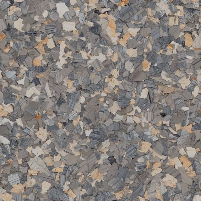 A close up of a pile of rocks on a surface.