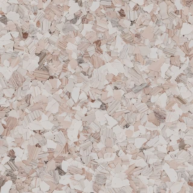 A close up of a pile of white and brown wood chips.
