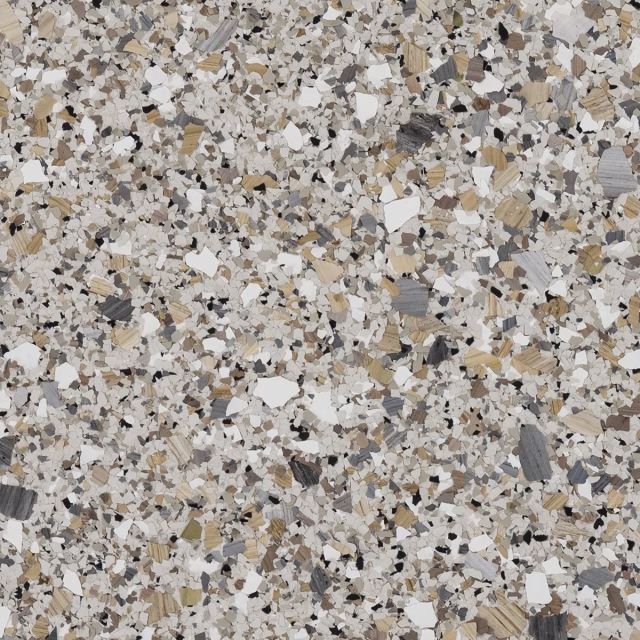 A close up of a granite counter top with a lot of small stones on it.