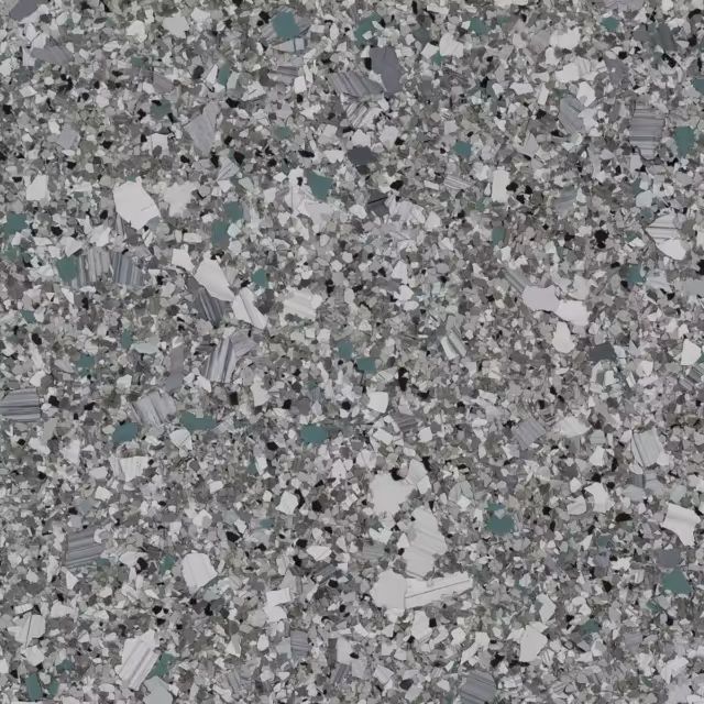 A close up of a gray and white granite counter top.