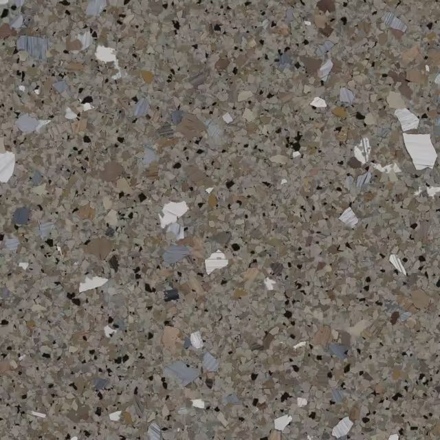 A close up of a marble floor with a lot of small stones on it.