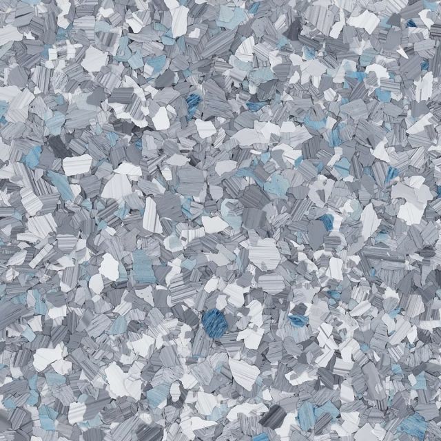 A close up of a pile of gray and white chips.