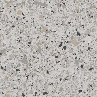 A close up of a white granite counter top with black spots.