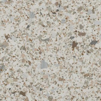 A close up of a white and brown granite counter top.