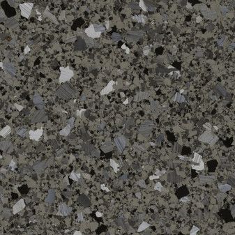 A close up of a gray and black granite counter top.