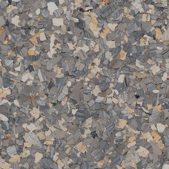 A close up of a pile of rocks on a surface.