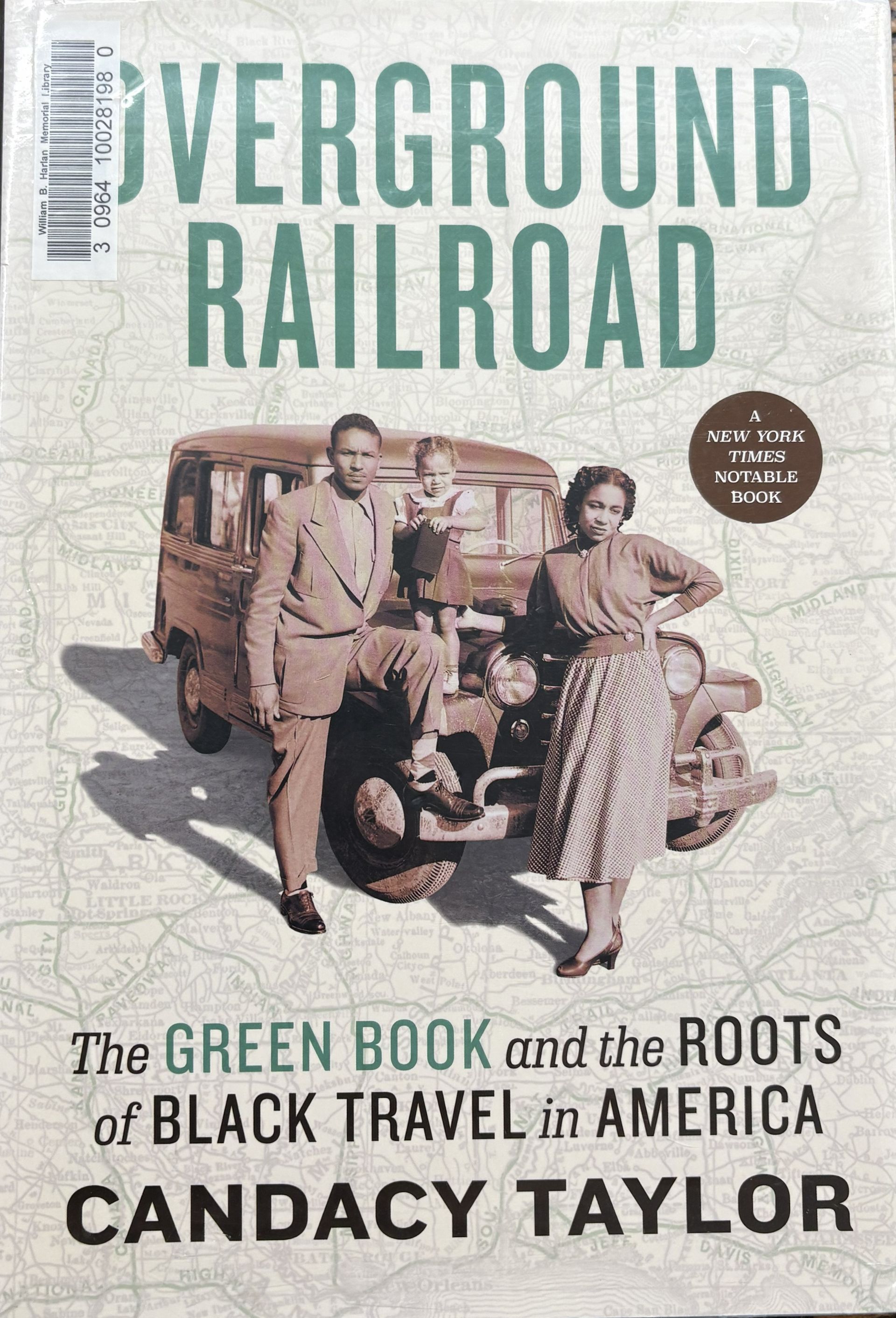 Book Title :"Overground railroad : the Green Book and the roots of Black travel in America" byTaylor, Candacy A. Cover displays a man and woman standing in front of a car with a map background.