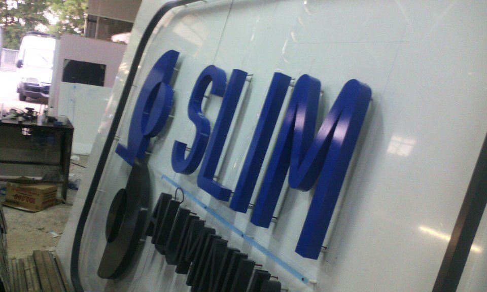 insegne per attività commerciali