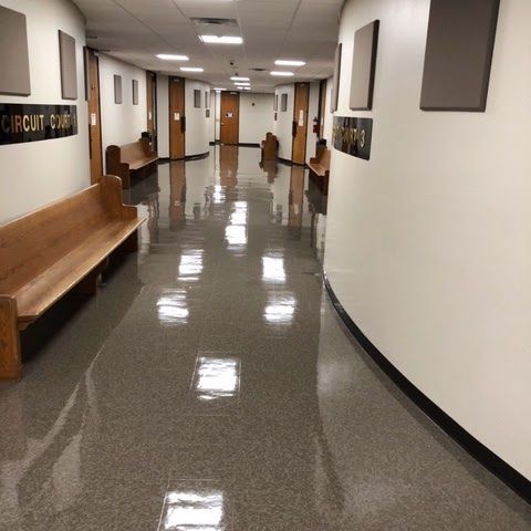 A long hallway with a sign that says circuit court