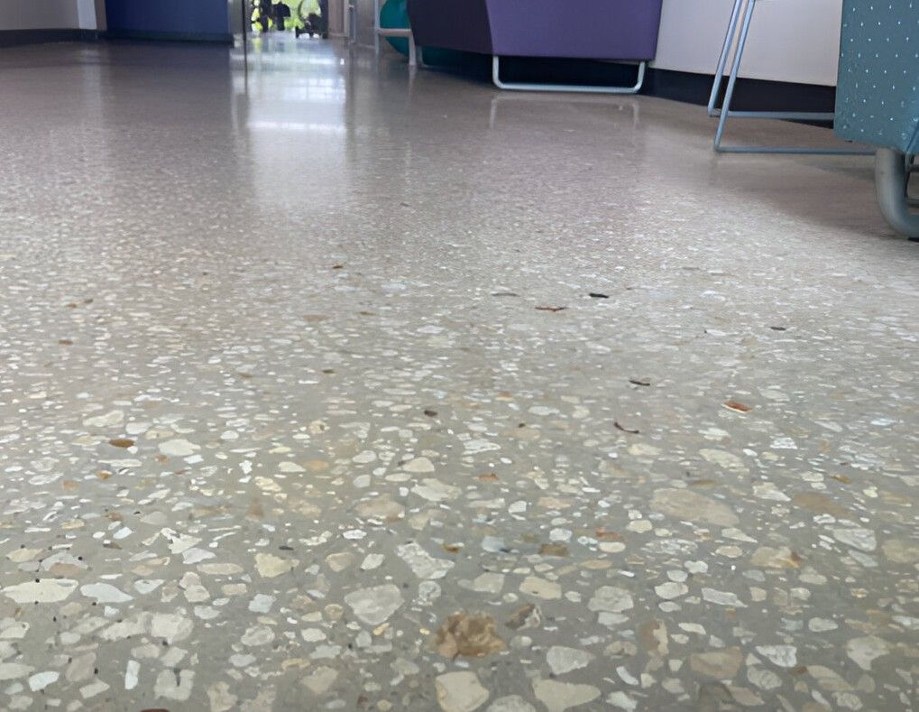 A colorful circular pattern on a white surface