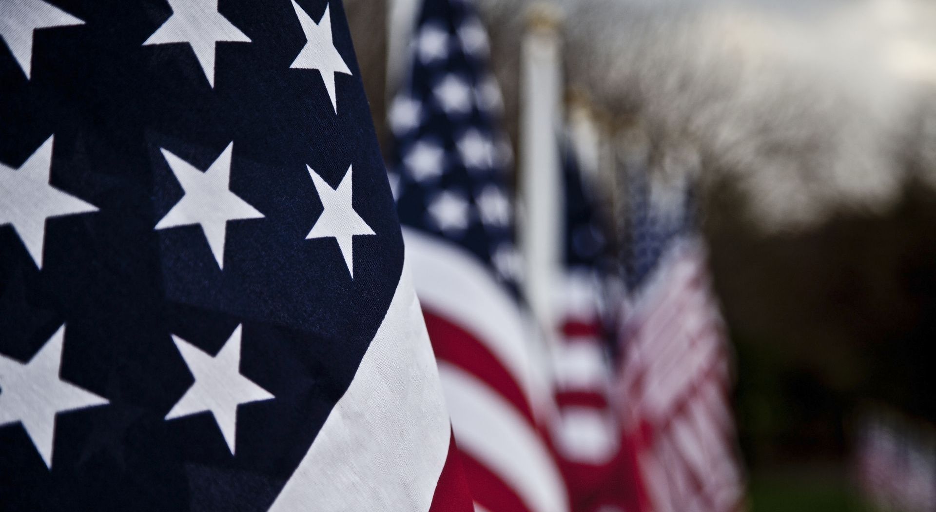 A close up of an American flag with stars on it