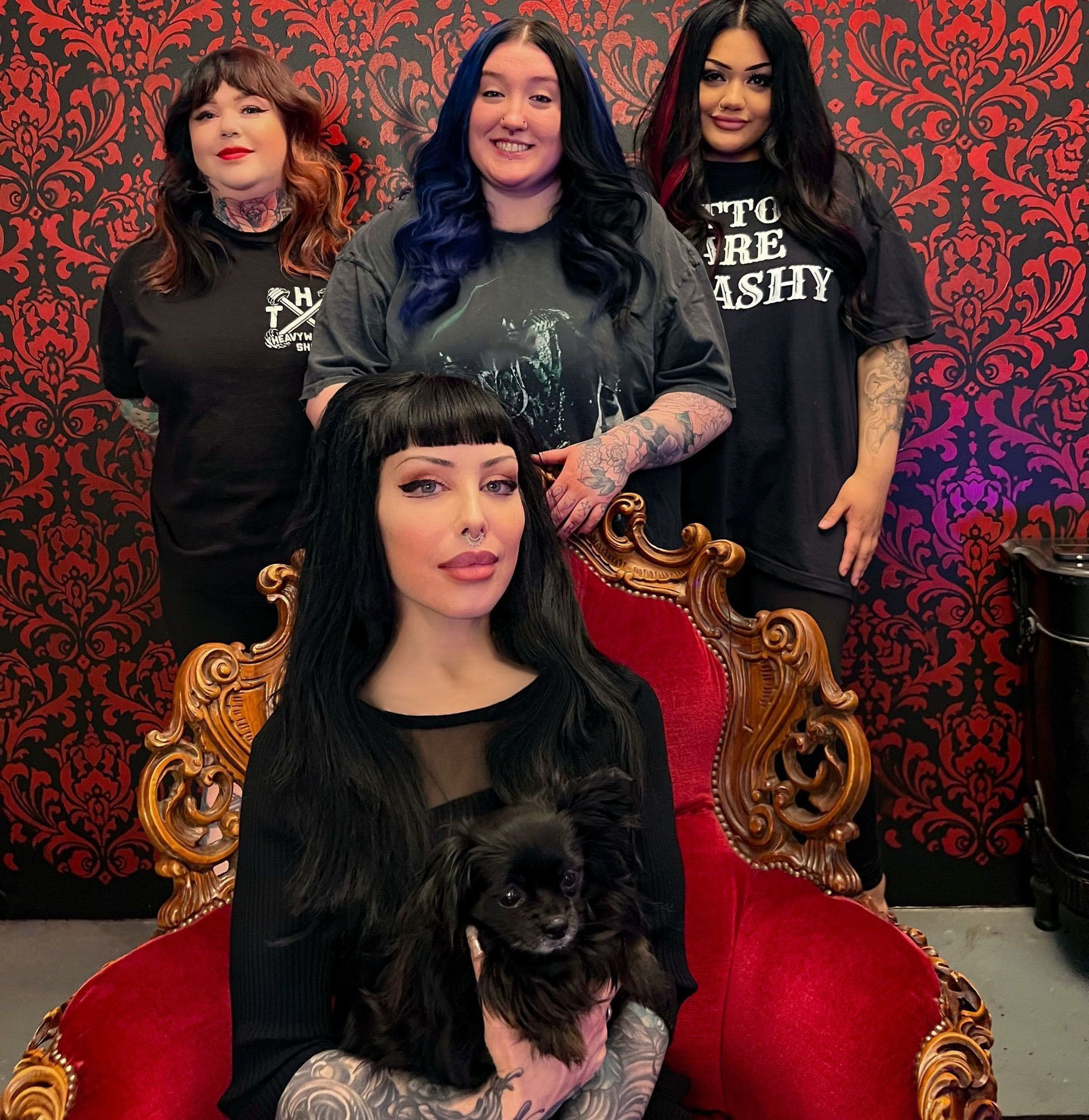 A group of women are posing for a picture together.