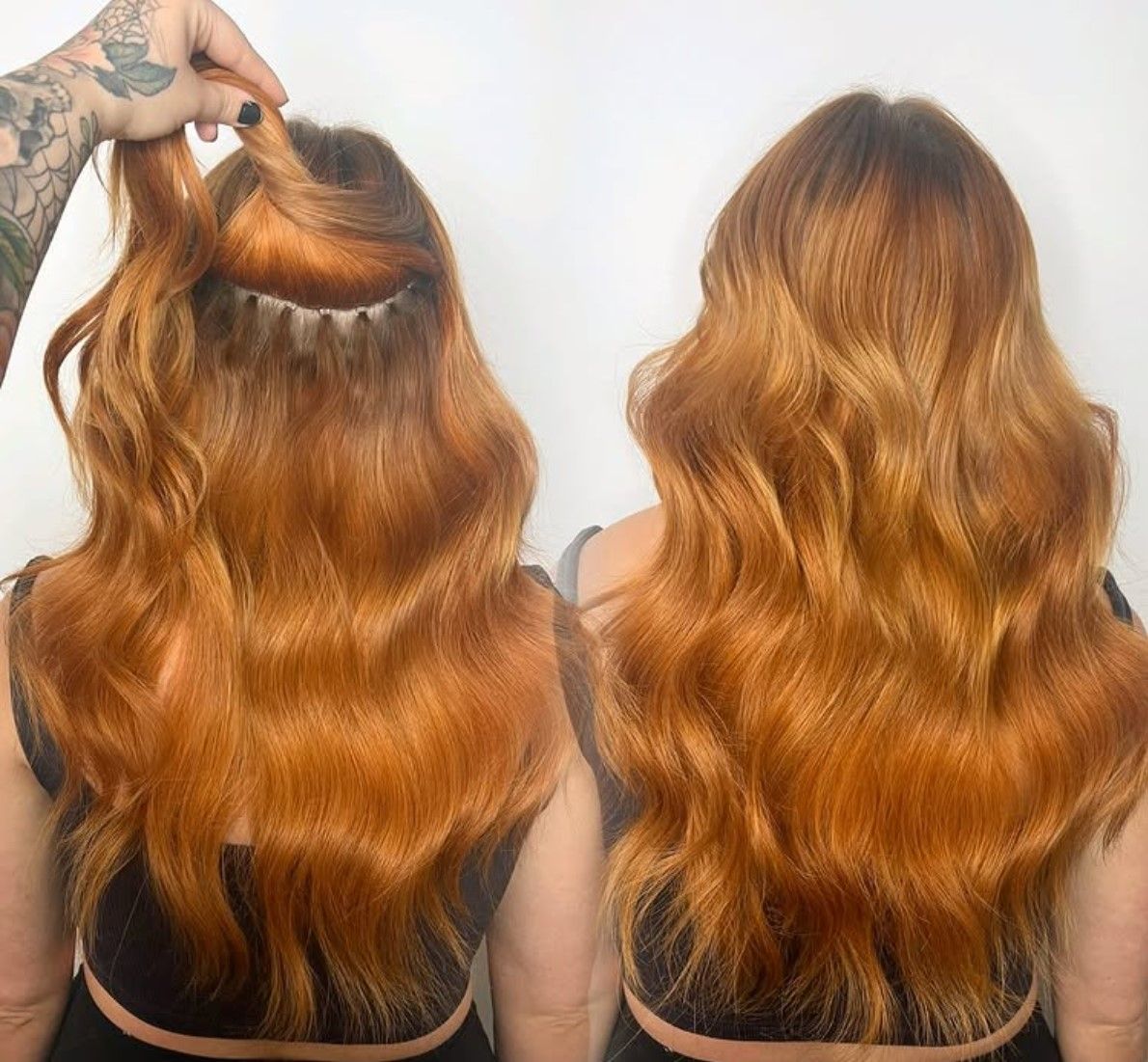 A woman with long red hair is getting her hair done by a hairdresser.