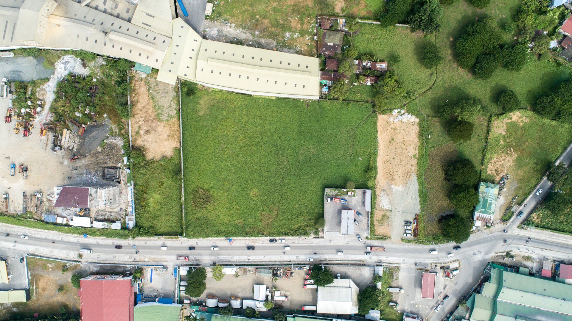 An aerial view of a city with a lot of buildings and trees.