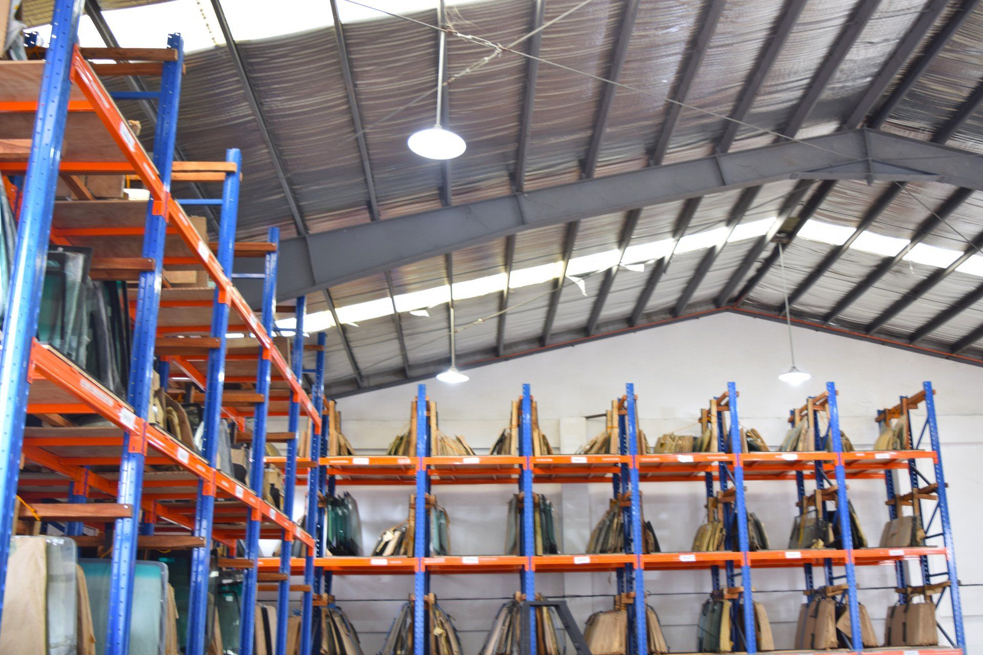 A large warehouse filled with shelves and boxes.