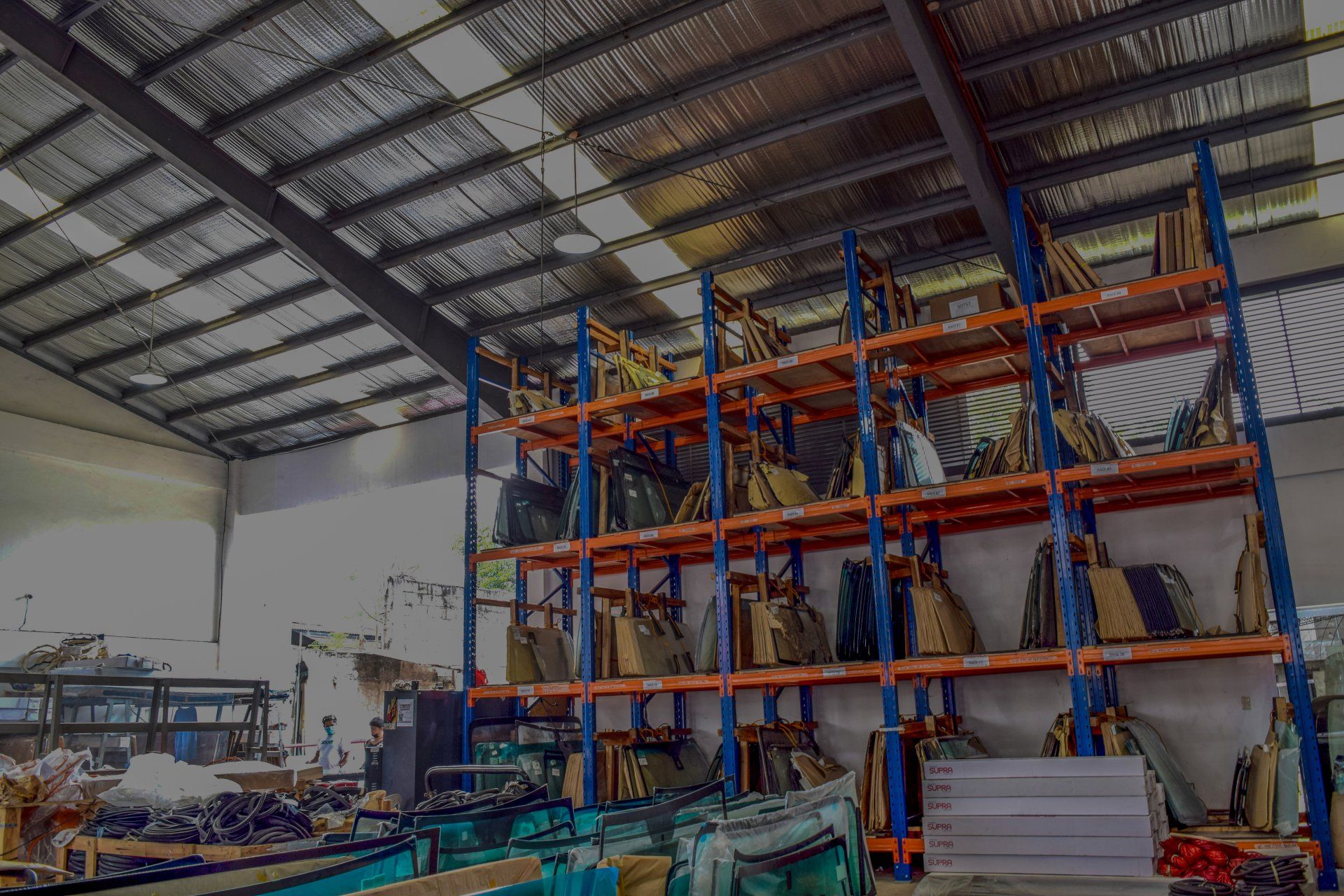A warehouse filled with lots of shelves and boxes.